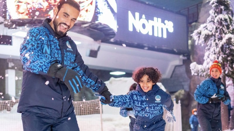 A family skiing and having fun