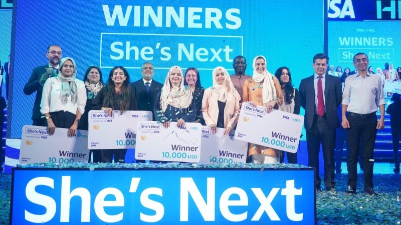 Winners of She's Next Initiative standing together
